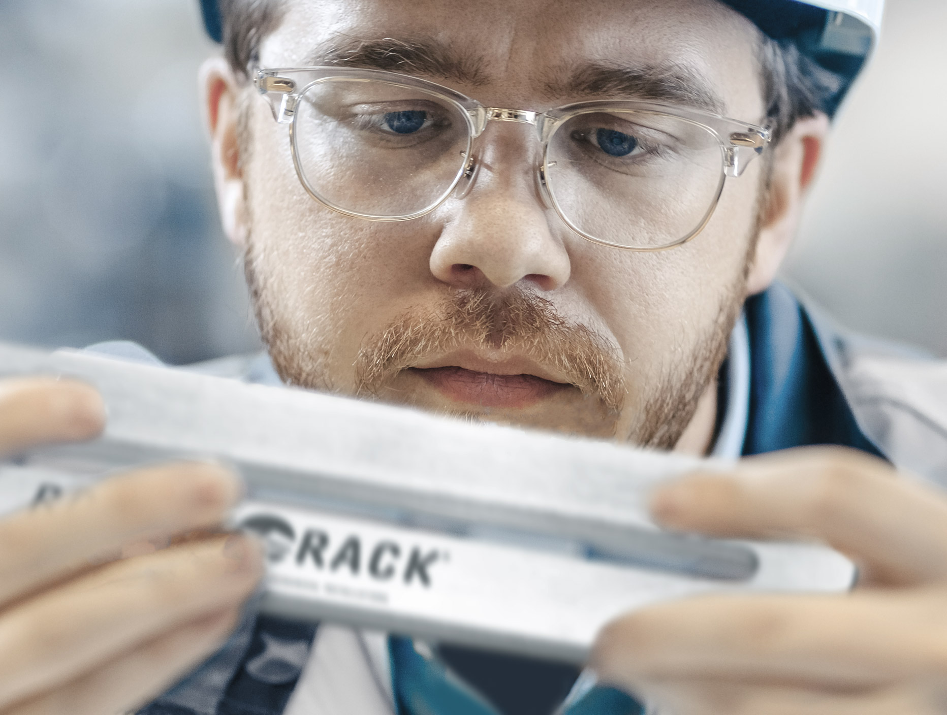 Inspector carefully examines the sanitary design of rocket rack post mount